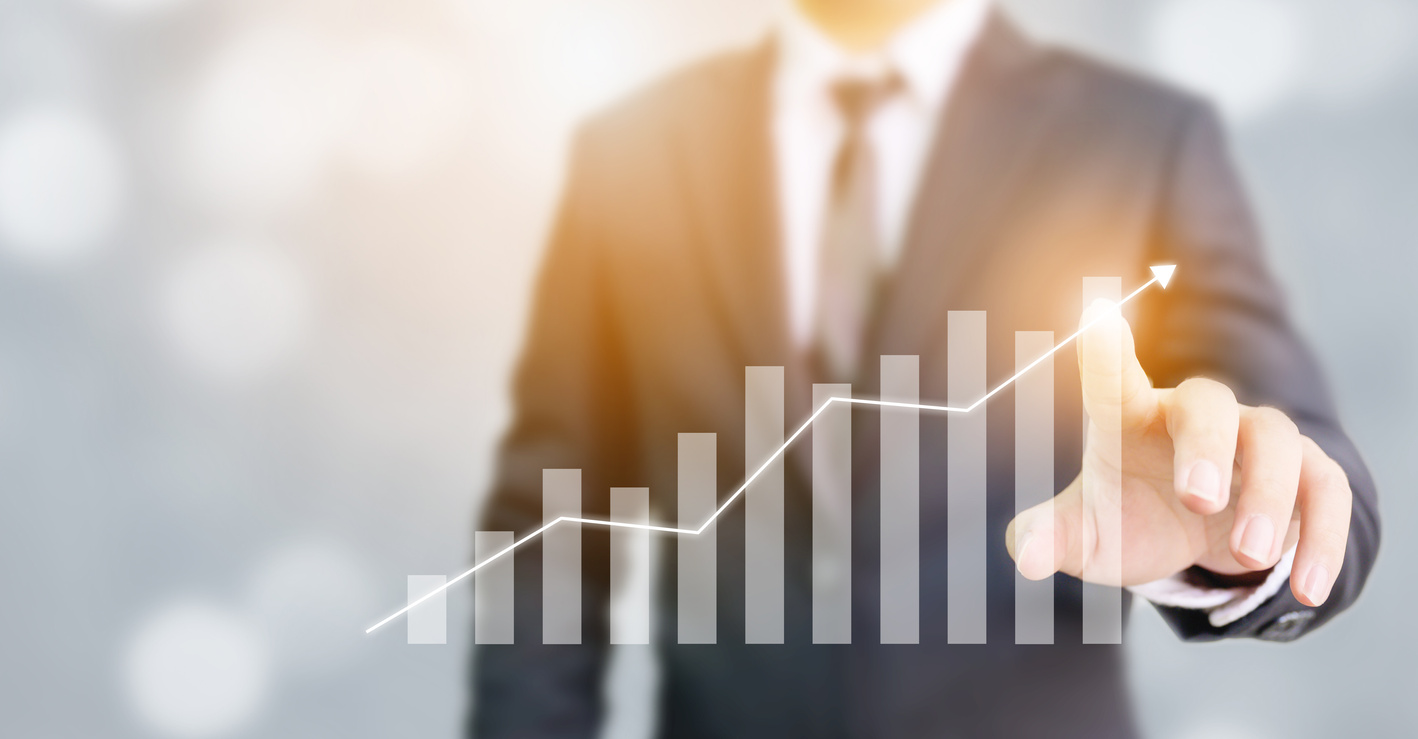 Business development to success and growing annual revenue growth concept, Businessman pointing arrow graph corporate future growth plan